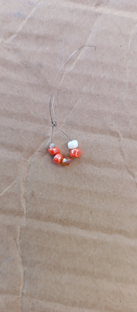 Accessories, Earring, Jewelry, Necklace, Bead, Gemstone, Ornament, Outdoors, Nature, Silver, Box, Cardboard, Bracelet, Pendant, Carton, Bead Necklace, Crystal, Prayer, Prayer Beads, Medication, Strap, Sand, Food, Sweets, Rock, Collar, Desert, Wood, Agate