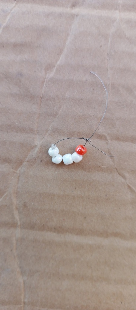 Accessories, Earring, Jewelry, Necklace, Bead, Gemstone, Cardboard, Ornament, Box, Carton, Flower, Plant, Paper, Crystal, Nature, Outdoors, Pearl, Medication, Floor, Pebble, Bead Necklace, Weather, Wood, Bracelet, Petal, Sphere, Leaf, Food, Sweets, Flooring, Pill, Balloon, Pendant, Coil, Spiral, Produce, Pin, Animal, Invertebrate, Sea Life, Seashell, Collar, Diamond, Strap