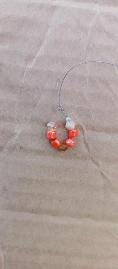 Accessories, Earring, Jewelry, Necklace, Gemstone, Bead, Ornament, Bracelet, Bead Necklace, Agate, Coil, Spiral, Crystal, Wood, Food, Sweets, Mineral, Opal, Box, Diamond, Cardboard, Prayer, Prayer Beads, Pepper, Plant, Produce, Vegetable, Collar, Animal, Invertebrate, Sea Life, Seashell, Leaf, Heart, Rock, Silver