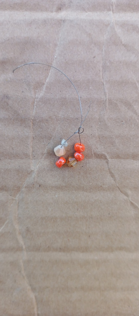 Accessories, Earring, Jewelry, Necklace, Bead, Gemstone, Animal, Wood, Ornament, Invertebrate, Sea Life, Seashell, Cardboard, Box, Food, Produce, Agate, Fruit, Plant, Seafood, Coil, Spiral, Sphere, Pendant, Carton, Bead Necklace, Figurine, Cricket Insect, Insect, Nature, Outdoors, Beak, Bird, Home Decor, Linen, Citrus Fruit, Grapefruit, Floor, Spider, Grain, Seed, Cat, Mammal, Pet, Weapon, Crystal, Nut, Vegetable, Silver, Flooring, Clam, Crawdad, Collar, Bud, Flower, Sprout, Leaf