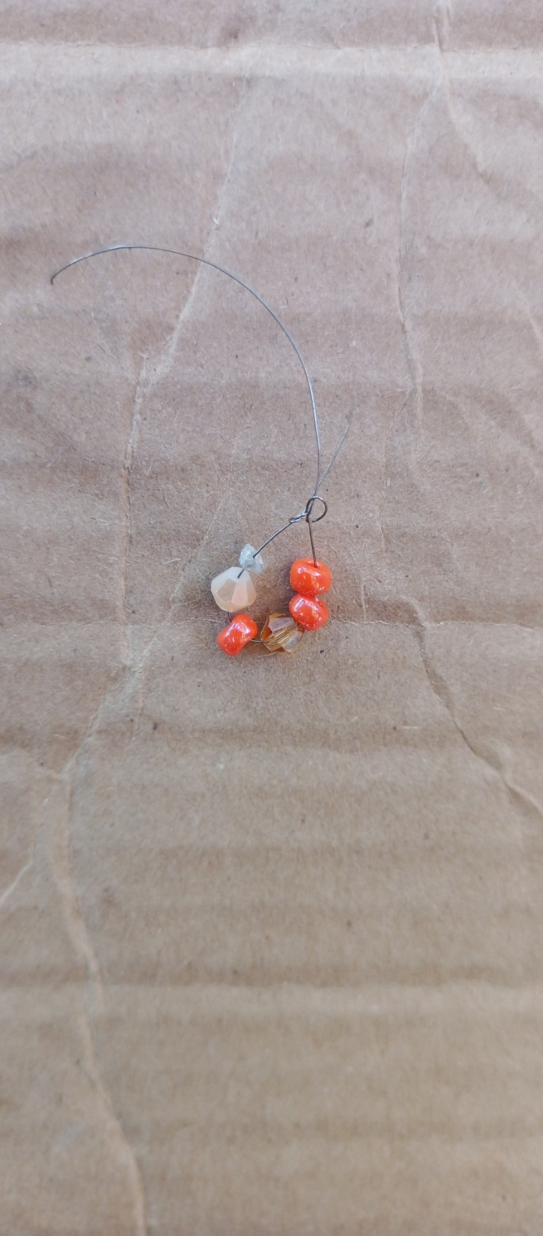 Accessories, Earring, Jewelry, Necklace, Bead, Gemstone, Animal, Wood, Ornament, Invertebrate, Sea Life, Seashell, Cardboard, Box, Food, Produce, Agate, Fruit, Plant, Seafood, Coil, Spiral, Sphere, Pendant, Carton, Bead Necklace, Figurine, Cricket Insect, Insect, Nature, Outdoors, Beak, Bird, Home Decor, Linen, Citrus Fruit, Grapefruit, Floor, Spider, Grain, Seed, Cat, Mammal, Pet, Weapon, Crystal, Nut, Vegetable, Silver, Flooring, Clam, Crawdad, Collar, Bud, Flower, Sprout, Leaf