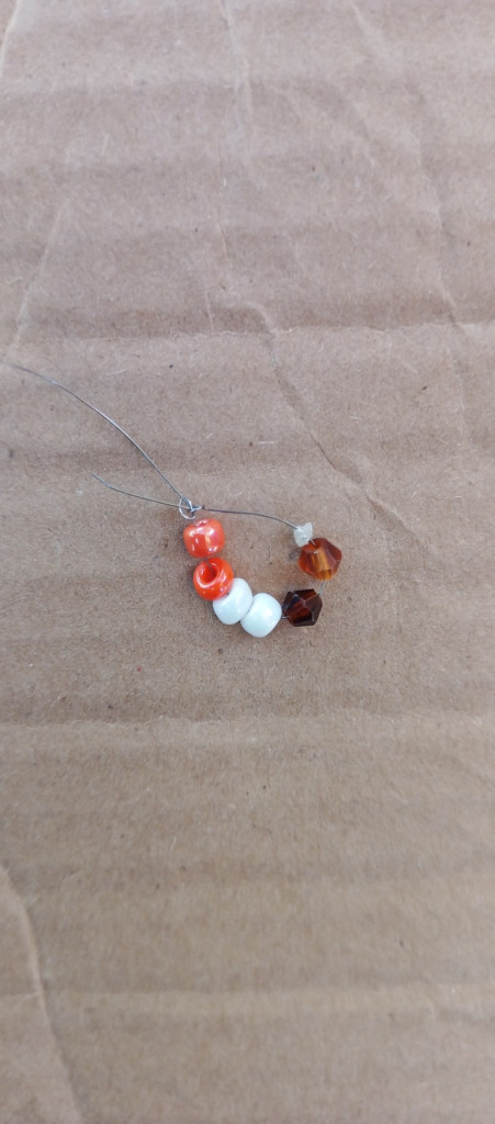 Accessories, Earring, Jewelry, Bead, Necklace, Gemstone, Ornament, Bead Necklace, Prayer, Prayer Beads, Bracelet, Food, Fruit, Plant, Produce, Wood, Crystal, Balloon, Pin, Collar, Pearl, Pendant, Floor, Box, Agate, Sweets, Mineral, Silver, Flooring, Strap, Rock, Cross, Symbol, Cardboard