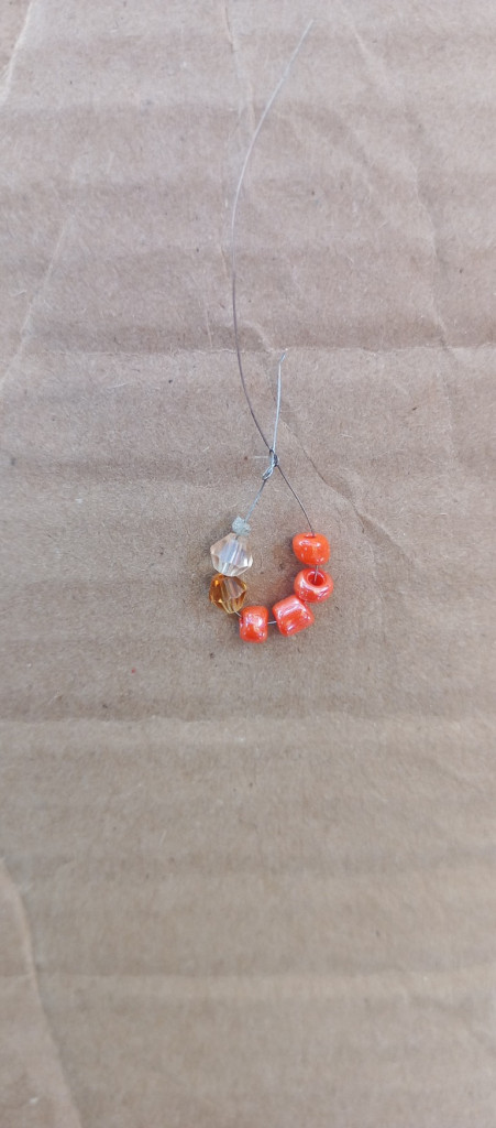 Accessories, Earring, Jewelry, Necklace, Gemstone, Bead, Ornament, Leaf, Plant, Bead Necklace, Diamond, Food, Produce, Crystal, Box, Sweets, Pendant, Cardboard, Agate, Animal, Weapon, Prayer, Prayer Beads, Sea Life, Home Decor, Linen, Silver, Fruit, Opal, Invertebrate, Seashell, Cross, Symbol, Coil, Spiral, Seafood, Floor, Spider, Pattern, Maple, Tree, Collar, Balloon, Carton, Bracelet, Aluminium, Flooring, Rock, Coin, Money