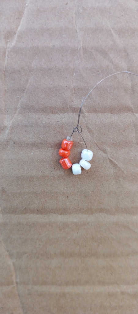 Accessories, Earring, Jewelry, Necklace, Medication, Pill, Bead, Gemstone, Food, Sweets, Pebble, Ornament, Cardboard, Box, Weapon, Produce, Carton, Rock, Agate, Silver, Candy, Green, Leaf, Plant, Turquoise, Pendant, Bean, Vegetable, Hoop